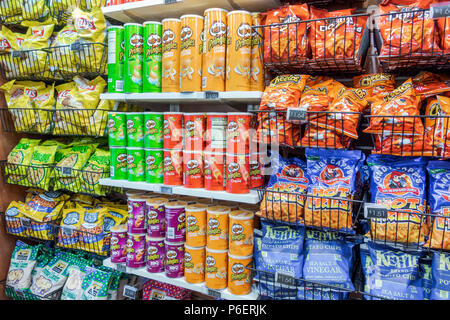 Florida,Fort Ft. Pierce,Florida's Turnpike toll road,rest stop,convenience store,snack junk food display sale,potato chips,Pringles,Cheetos,visitors t Stock Photo