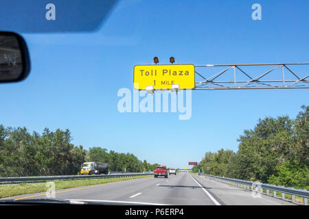 Florida,Fort Ft. Pierce,Florida's Turnpike toll road plaza,distance information sign,roadway,highway,traffic,visitors travel traveling tour tourist to Stock Photo