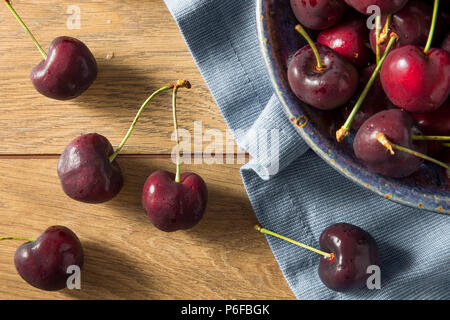 Raw Red Organic Cherries in a Bowl Stock Photo