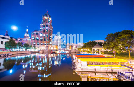 milwaukee downtown with reflection in water at night,milwaukee,wisconsin,usa. Stock Photo