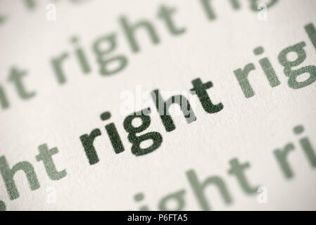 word right printed on white paper macro Stock Photo