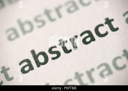 word abstract printed on white paper macro Stock Photo