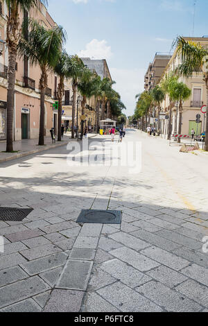 Brindisi, Italy - April 30, 2018: Sunny morning in Corso Garibaldi with some tourists in Brindisi (Italy) Stock Photo
