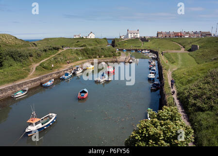 Boats moored in the harbour at Seaton Sluice, Northumberland, UK Stock Photo