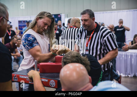 men arm wrestling match Stock Photo