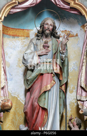 Sacred Heart of Jesus, altar in church of Assumption in Sveta Marija na Muri, Croatia Stock Photo