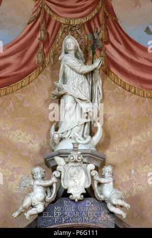 Assumption of the Virgin, statue on the altar of Saint Michael in Church of Assumption of Virgin Mary in Zakanje, Croatia Stock Photo