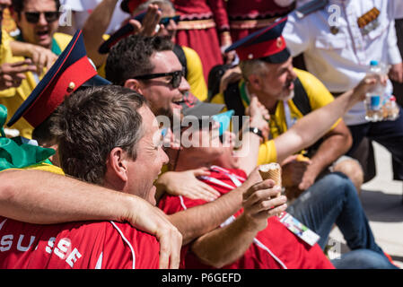 ROSTOV-ON-DON, RUSSIA - JUNE 17, 2018: Swiss fans enjoy cossack show at the airport Stock Photo