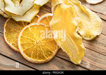 Dried fruit slices on  wooden background. Organic food. Stock Photo