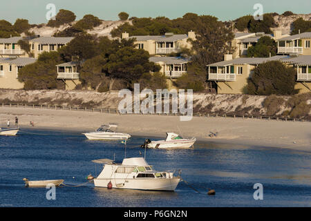 Anchored pleasure boats and holiday units at Longreach Bay on Rottnest Island, Western Australia Stock Photo