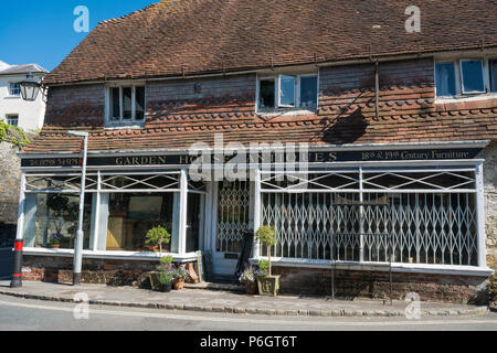 Garden house antiques shop selling 18th and 19th century furniture in Petworth, West Sussex, UK Stock Photo