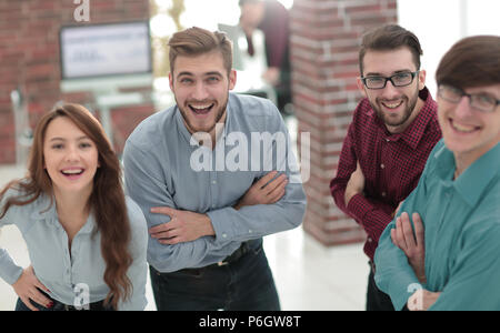 Smiling american team discussing business project during coffee  Stock Photo