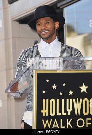 Usher at the star for Kenny Babyface Edmonds  on the Hollywood Walk Of Fame in Los Angeles.Usher 123  Event in Hollywood Life - California, Red Carpet Event, USA, Film Industry, Celebrities, Photography, Bestof, Arts Culture and Entertainment, Topix Celebrities fashion, Best of, Hollywood Life, Event in Hollywood Life - California, movie celebrities, TV celebrities, Music celebrities, Topix, Bestof, Arts Culture and Entertainment, Photography,    inquiry tsuni@Gamma-USA.com , Credit Tsuni / USA, Honored with a Star on the Hollywood Walk ofFame in Los Angeles,  2013 Stock Photo