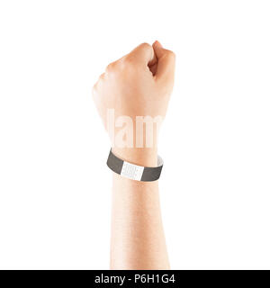 Blank black paper wristband mock up on persons arm. Empty event wrist band design mockup on hand. Cheap bracelets template, isolated. Clear adhesive bangle wristlet with sticker. Concert armlet Stock Photo