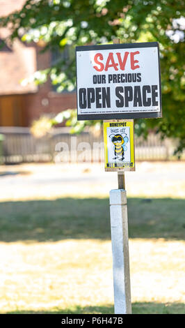 Protest placards against greenbelt development by local residents over the proposed building of 250 homes on a greenbelt site in Brentwood, Essex Stock Photo