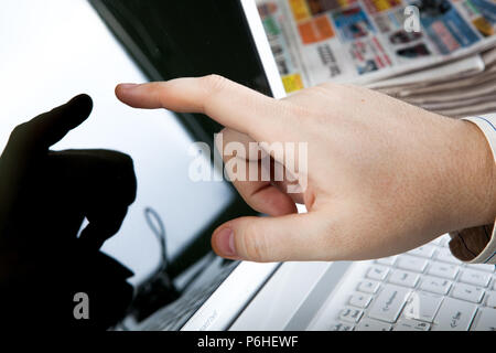 human touching on the Tablet PC close-up Stock Photo