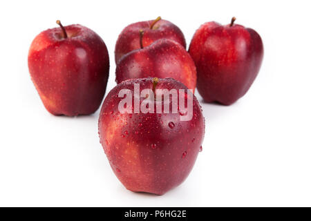 maroon apples closeup on a white background Stock Photo