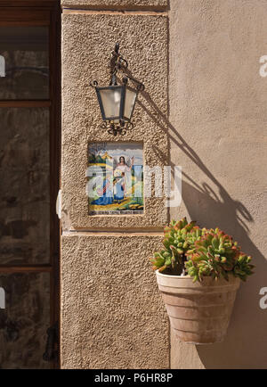 A tile plaque n in Valldemossa, Mallorca, in honour of the local saint, Santa Catalina Thomas who was born in the village. Stock Photo