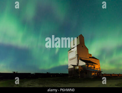 Aurora Borealis over a historic grain elevator in Pennant, Saskatchewan, Canada Stock Photo