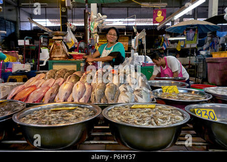 Thailand indoor fish market with female food vendor. S. E. Asia Stock ...