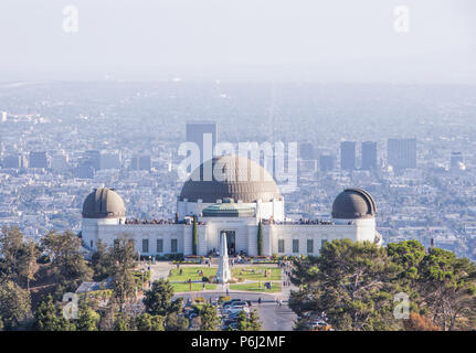 4 September 2016 - Los Angeles, USA. Famous Griffith Observatory museum building on the Hollywood Hills. Many tourists visiting planetarium with sceni Stock Photo