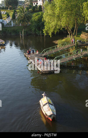 Small paddle ferry Istana jetty Sarawak River Kuching Sarawak Malaysia Stock Photo