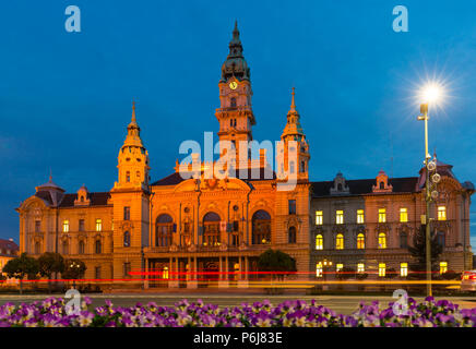 Illuminated building of Gyor City Hall in twilight, Hungary Stock Photo