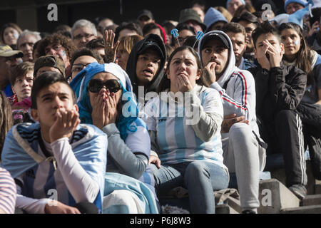 Buenos Aires, Argentina, 30th June, 2018. Sports.- 2018 June 30, city of Buenos Aires, Argentina.- Argentinians fan watch the game between France and Argentina, in a big screen. Argentina lost 4 to 3 versus France. Credit: Julieta Ferrario/ZUMA Wire/Alamy Live News Stock Photo