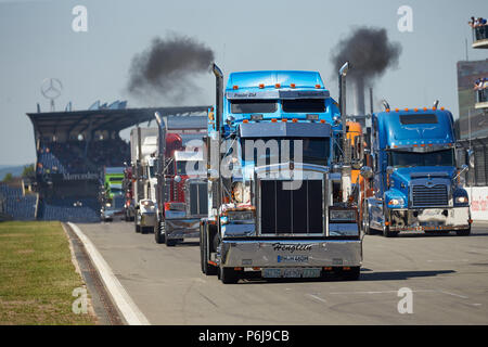 Nuerburg, Germany. 30th June, 2018. US Trucks take part in the parade at the ADAC Truck Grand Prix at the Nuerburgring. Credit: Thomas Frey/dpa/Alamy Live News Stock Photo