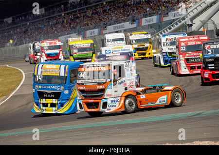 Nuerburg, Germany. 30th June, 2018. The racing trucks of the FIA European Truck Racing Championship start in the race at the ADAC Truck Grand Prix at the Nuerburgring. Pictured in front are Jose Rodriguez (Portugal, l) and Stephanie Halm (Germany). Credit: Thomas Frey/dpa/Alamy Live News Stock Photo