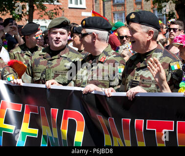 Members of the Defence Forces who are participating for the first time in uniform. take part in the annual LGBTI+ Dublin Pride Parade, the second biggest festival in Ireland after St Patrick's Day. Saturday 30th June 2018, St. Stephen’s Green, Dublin, Ireland Stock Photo