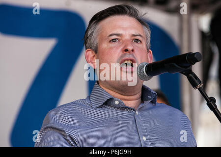 London, UK. 30th June 2018. Jonathan Ashworth, Shadow Secretary of State for Health, addresses thousands of people, including many nurses, doctors and health workers, taking part in a rally to mark the 70th birthday of the National Health Service (NHS) and to demand an end to cuts to and privatisation of public services. The event was organised by the People's Assembly Against Austerity, Health Campaigns Together, the TUC and eleven other health trade unions. Credit: Mark Kerrison/Alamy Live News Stock Photo