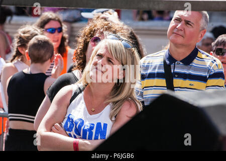 London, UK. 30th June 2018. Former Coronation Street actress Sally Lindsay listens to speeches at a rally to mark the 70th birthday of the National Health Service (NHS) and to demand an end to cuts to and privatisation of public services. The event was organised by the People's Assembly Against Austerity, Health Campaigns Together, the TUC and eleven other health trade unions. Credit: Mark Kerrison/Alamy Live News Stock Photo