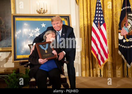 WASHINGTON, DC - WEEK OF JUNE 24: President Donald J. Trump presents the Medal of Honor to Mrs. Pauline Conner, widow of the late U.S. Army 1st Lt. Garlin Murl Conner, on Tuesday, June 26, 2018, in the East Room of the White House.  People:  President Donald Trump Stock Photo