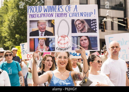 Atlanta, GA, USA. 29th June, 2018. Thousands gathered in front of the Atlanta Detention Center for the ''Families Belong Togather'' march before filling the streets and walking to the Richard Russell Federal bldg. The march is in response to the Trump administration's policy to detain immigrants and separate children from their parents. Credit: Steve Eberhardt/ZUMA Wire/Alamy Live News Stock Photo