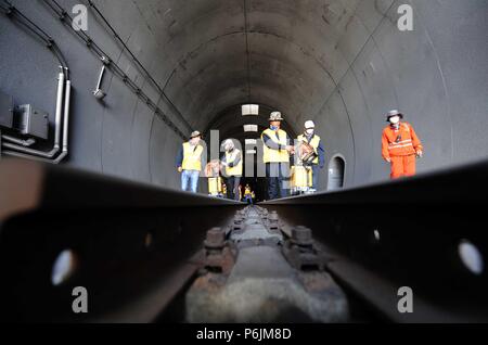 Beijing, Qinghai-Tibet Railway in northwest China's Qinghai Province. 27th June, 2018. Maintenance workers check the tracks at the Xinguanjiao Tunnel, the world's longest plateau rail tunnel, along the Qinghai-Tibet Railway in northwest China's Qinghai Province, June 27, 2018. Credit: Hou Deqiang/Xinhua/Alamy Live News Stock Photo