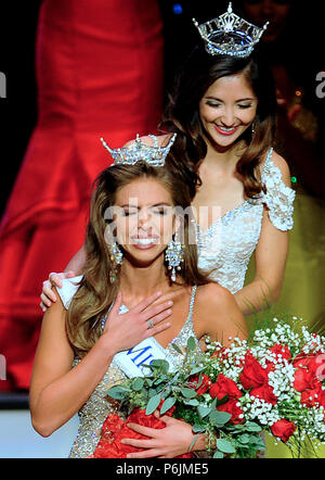 Lakeland, Florida, USA. 30th Jun, 2018. Miss Florida 2017, Sara Zeng, places a crown on Taylor Tyson after Tyson was named Miss Florida 2018 at the Miss Florida Pageant on June 30, 2018 at the RP Funding Center in Lakeland, Florida. She will represent Florida at the Miss America Pageant in September in Atlantic City. (Paul Hennessy/Alamy) Credit: Paul Hennessy/Alamy Live News Stock Photo