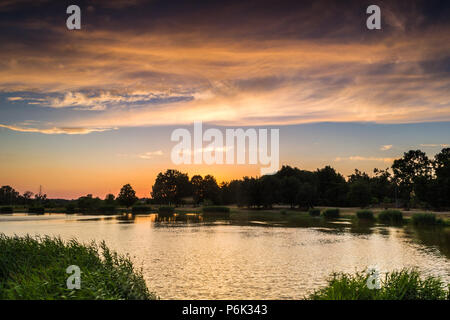 A beautiful sky illuminated by the setting sun Stock Photo