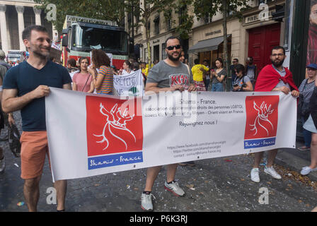 Paris, France, French Migrants Activists demonstrating, at Annual Gay Pride March, LGBT March, AIDES, NGO on Street, Campaign for Homosexual Equality, pride march Stock Photo