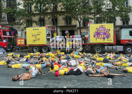 Paris, France, French AIDS Activists demonstrating, at Annual Gay Pride, LGBT Protest March, AIDES, NGO on Street, Campaign for Homosexual Equality social protesters, sad crowd, young activism, flashmob LAYING, 2018 Stock Photo