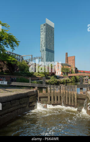 A general view of the Castlefield area of Manchester with lock 92 of the canal open in the foreground. Stock Photo