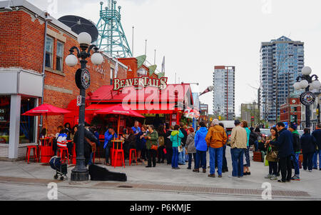 Ottawa, Canada - May 15, 2017. People waiting at coffee shop in Ottawa, Canada. Queen Victoria chose Ottawa as the capital of Canada in 1857. Stock Photo