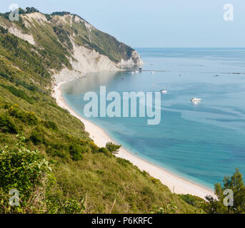 Summer Adriatic sea bay and Spiaggia Mezzavalle beach near Portonovo and Ancona towns in the Marche region. Italy, Conero rIviera. Stock Photo