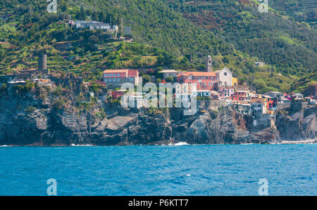 Beautiful summer Vernazza view from excursion ship. One of five famous villages of Cinque Terre National Park in Liguria, Italy, suspended between Lig Stock Photo