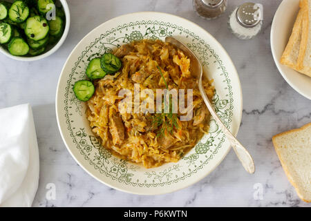 A traditional dish of some European countries is bigos made from cabbage, other vegetables and meat. Selective focus. Stock Photo