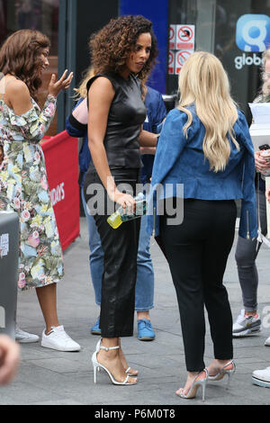 Rochelle Humes seen wearing a leather outfit as she speaks to Emma Bunton outside Global Radio Studios - London  Featuring: Rochelle Humes, Emma Bunton Where: London, United Kingdom When: 31 May 2018 Credit: WENN.com Stock Photo