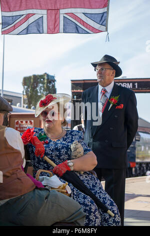 Kidderminster, UK. 1st July, 2018. A journey back in time continues at the Severn Valley Railway as all involved turn the clock back to the 1940s. Visitors and staff pull out all the stops to ensure a realistic wartime Britain is experienced by all on this heritage railway line. Credit: Lee Hudson/Alamy Live News Stock Photo