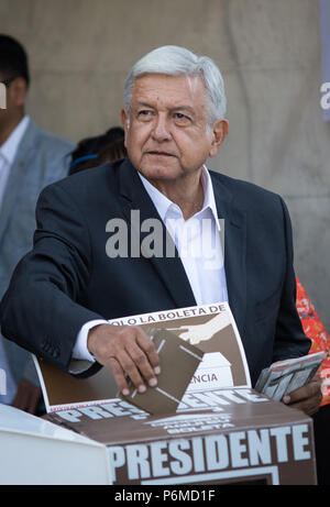 (180701) -- MEXICO CITY, July 1, 2018 (Xinhua) -- Andres Manuel Lopez Obrador, presidential candidate for the coalition 'Together We Will Make History', casts his vote during the presidential elections, in Mexico City, capital of Mexico, on July 1, 2018. Mexican electoral authorities on Sunday gave the green light for the country to begin the largest presidential elections in its history, with over 89 million eligible voters. (Xinhua/Francisco Canedo) (ce) Stock Photo