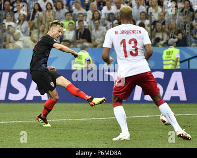 Nizhny Novgorod, Russia. 1st July, 2018. Ivan Rakitic (L) of Croatia competes during the 2018 FIFA World Cup round of 16 match between Croatia and Denmark in Nizhny Novgorod, Russia, July 1, 2018. Credit: He Canling/Xinhua/Alamy Live News Stock Photo