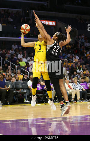 LOS ANGELES, CA - JULY 01: Los Angeles Sparks forward Candace Parker (3) drives to the basket and is fouled by Las Vegas Aces center A'ja Wilson (22) during a WNBA game between the Los Angeles Sparks and the Las Vegas Aces on July 01, 2018, at Staples Center, in Los Angeles, CA. Jordon Kelly/CSM Stock Photo